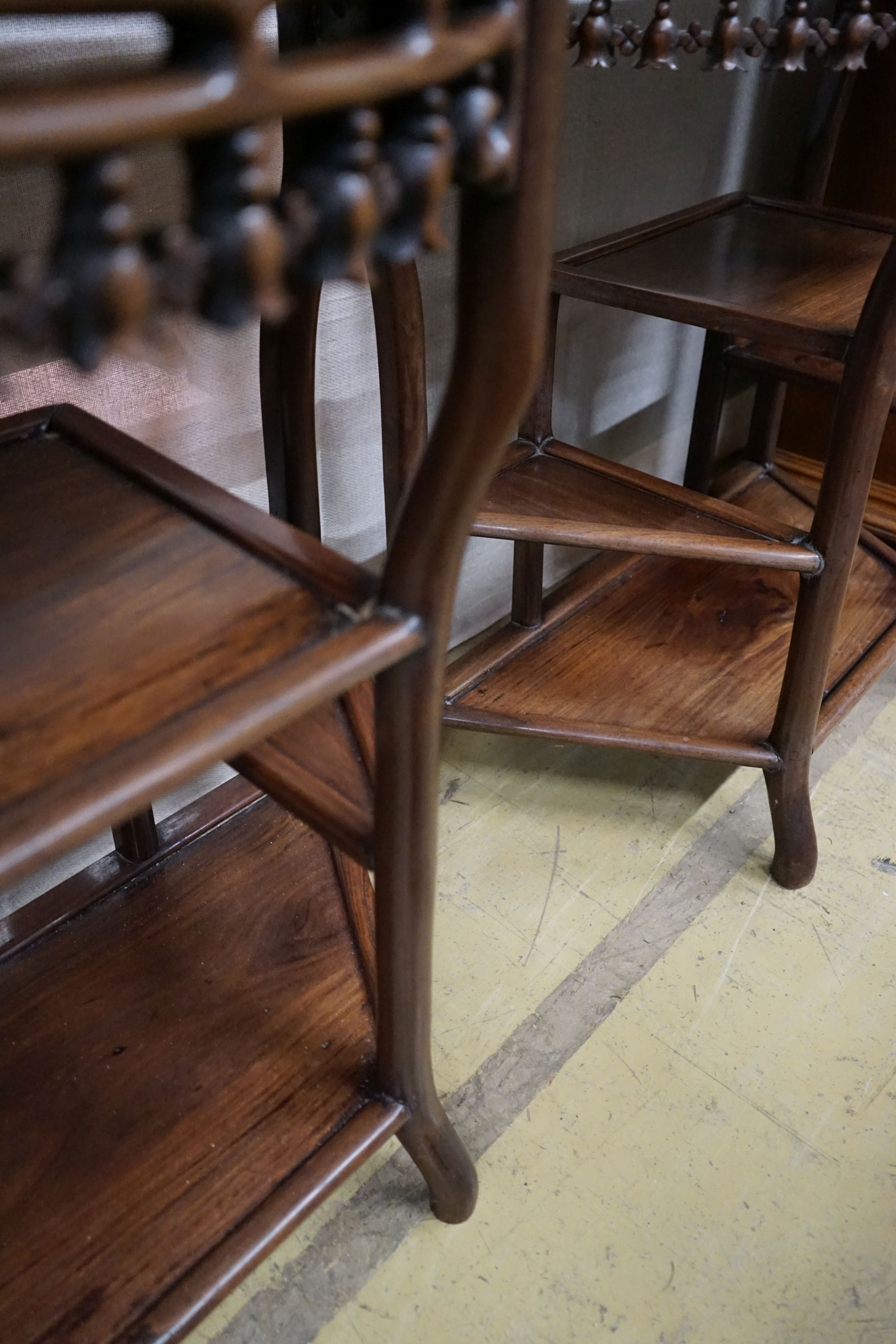 A pair of Chinese marble-topped demi lune console tables, width 82cm, depth 40cm, height 80cm
